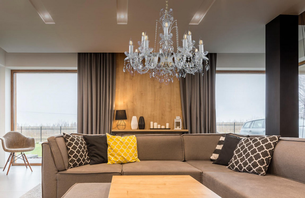 living room with crystal chandelier