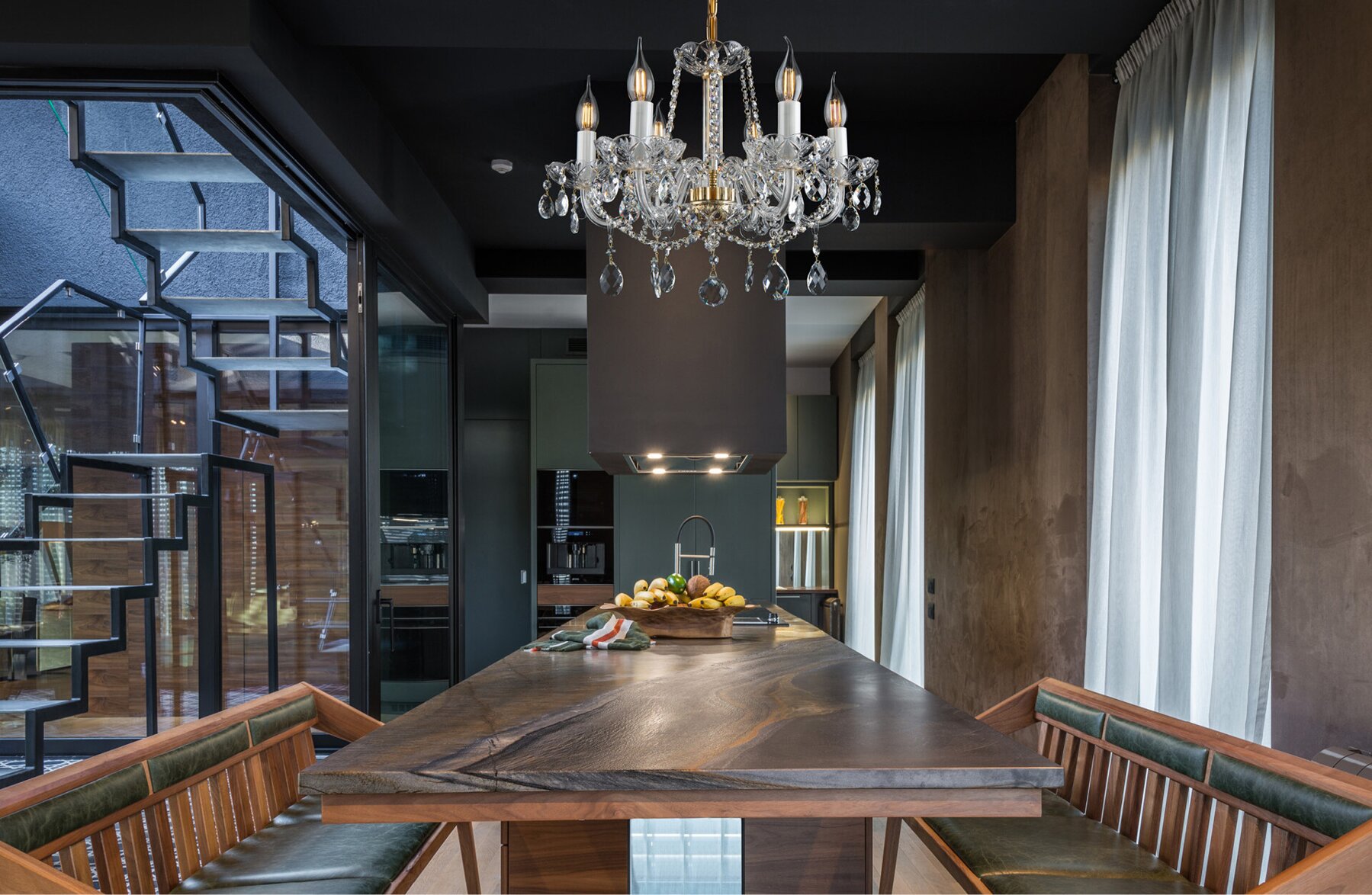 Crystal chandelier above the dining table in industrial style EL081601PB